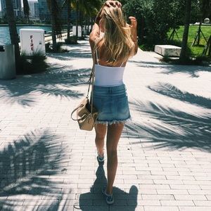 Light blue distressed jean skirt